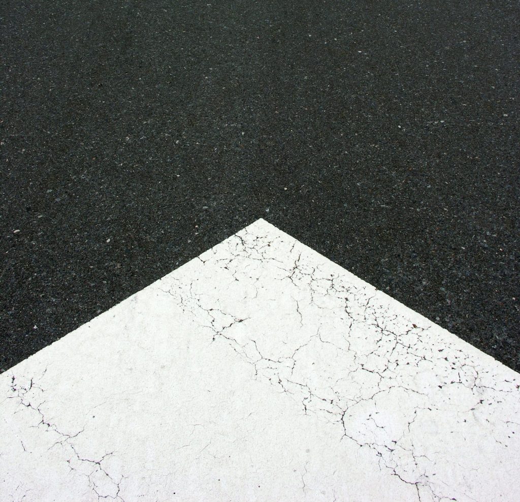 white floral textile on black textile